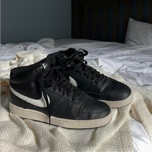 Black high top sneakers, size 8
Nike Air Force 1 High black and white trainers